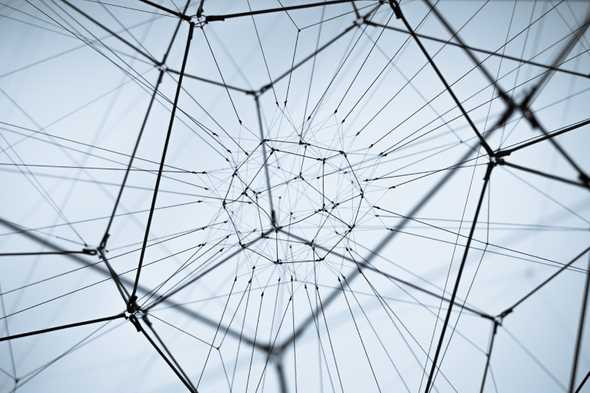 Modern abstract sculpture of metal net structure against white background, San Francisco Museum of Modern Art